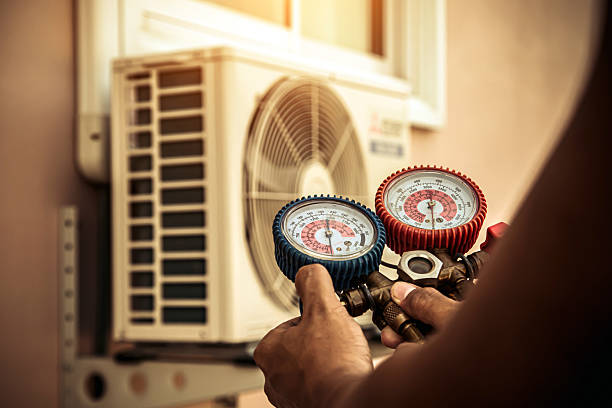 Professional Air Conditioning Service technician working in Malvern, AR